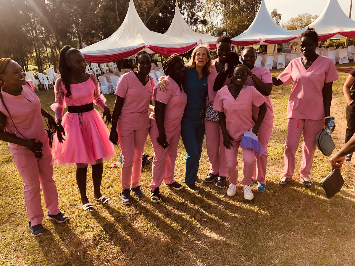 Boda Girls celebrate in their pink uniforms